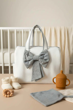 Wickeltasche mit Schleife, graues Band, Mutter und Baby