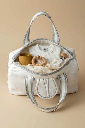 Wickeltasche mit Hasenohren für Mutter und Baby