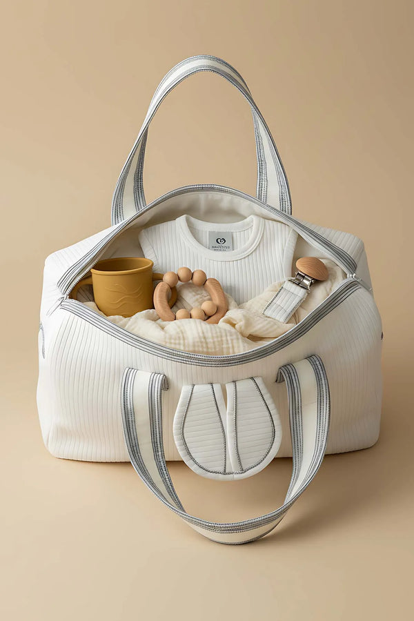 Wickeltasche mit Hasenohren für Mutter und Baby