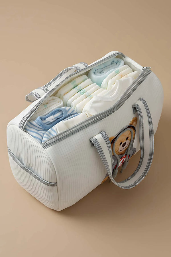 Wickeltasche mit Kapuze für Mutter und Baby