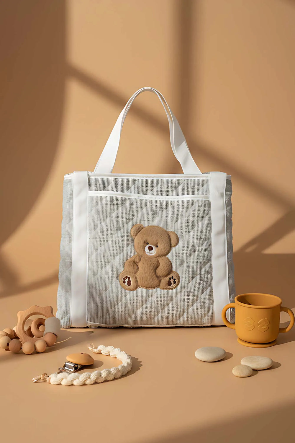Mehrzweck-Pflegetasche und Wickelunterlage mit Teddybär-Motiv