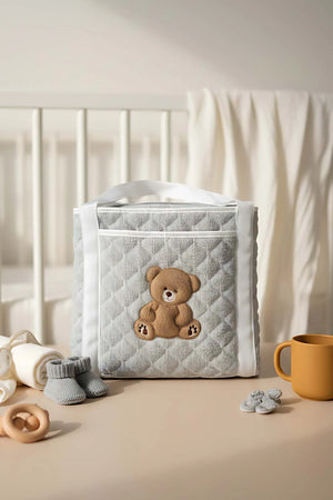 Mehrzweck-Pflegetasche und Wickelunterlage mit Teddybär-Motiv