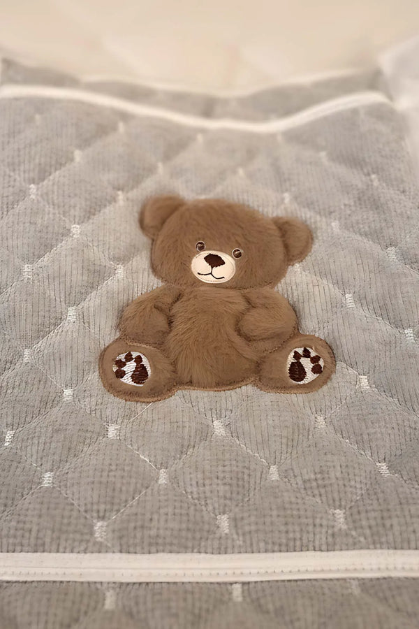 Mehrzweck-Pflegetasche und Wickelunterlage mit Teddybär-Motiv