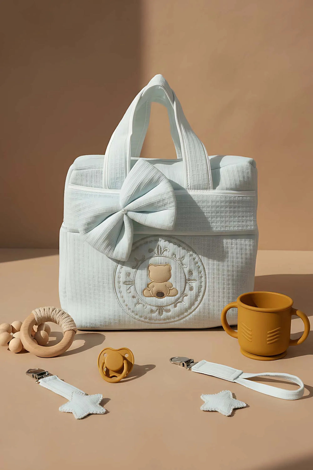 Wickeltasche mit blauem Teddybär-Schleifenmuster