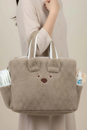 Wickeltasche mit Plüschteddybär