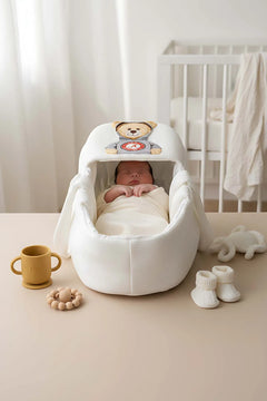 Babytrage mit Kapuze in Teddybärform