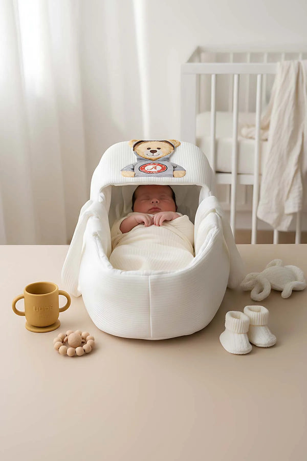 Babytrage mit Kapuze in Teddybärform
