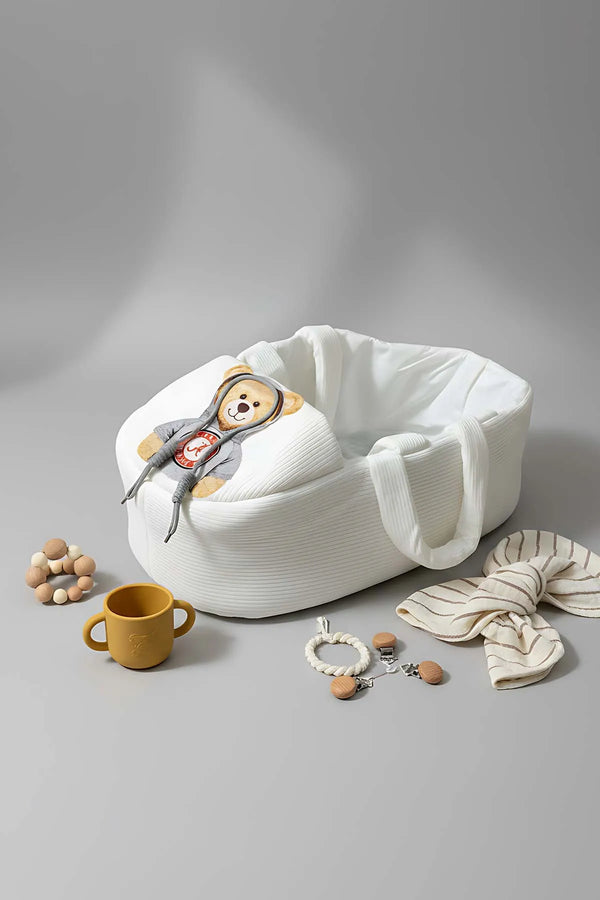 Babytrage mit Kapuze in Teddybärform