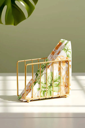 Goldener Serviettenhalter aus Metall in Käfigform