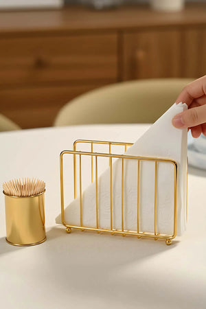 Goldener Serviettenhalter aus Metall in Käfigform