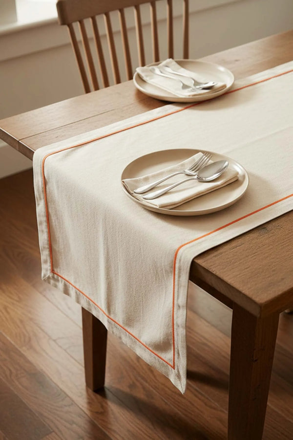 Tischläufer in Creme mit orangefarbenem Rand, 50 x 130 cm