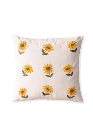 Cremefarbener Hintergrund, Sonnenblumenmuster, dekorativer Leinenkissenbezug mit Lochstickerei.